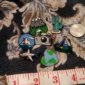 Travel themed enamel pins assortment